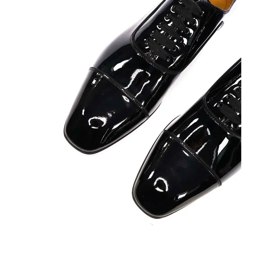 $1,295 LOUBOUTIN - Black Patent 